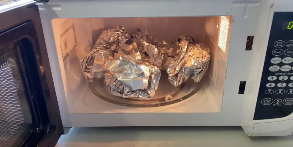 bulk-amounts-of-aluminium-foil-in-microwave - The Cooler Box