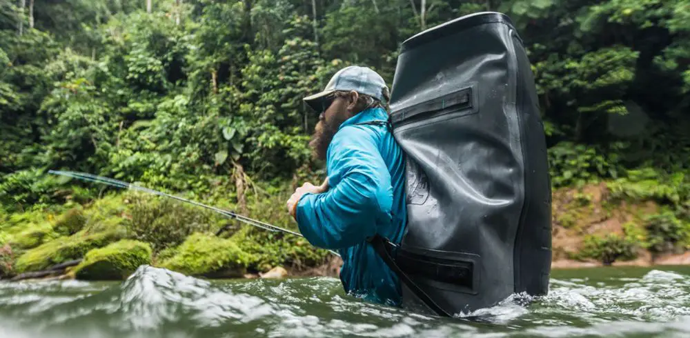 yeti-panga-100-duffel-bag-on-back-in-water - The Cooler Box